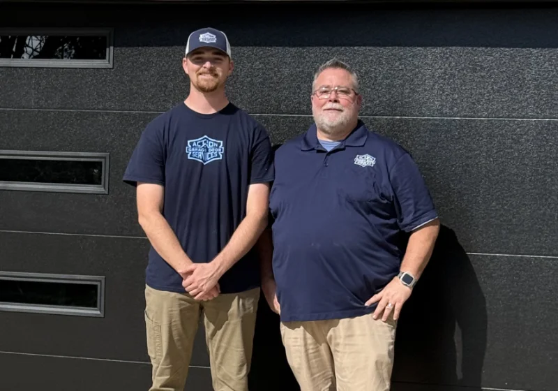 Jeff and his son outside a customer’s garage